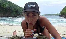 Hot brunette with pigtails gets wild on the beach with huge cock